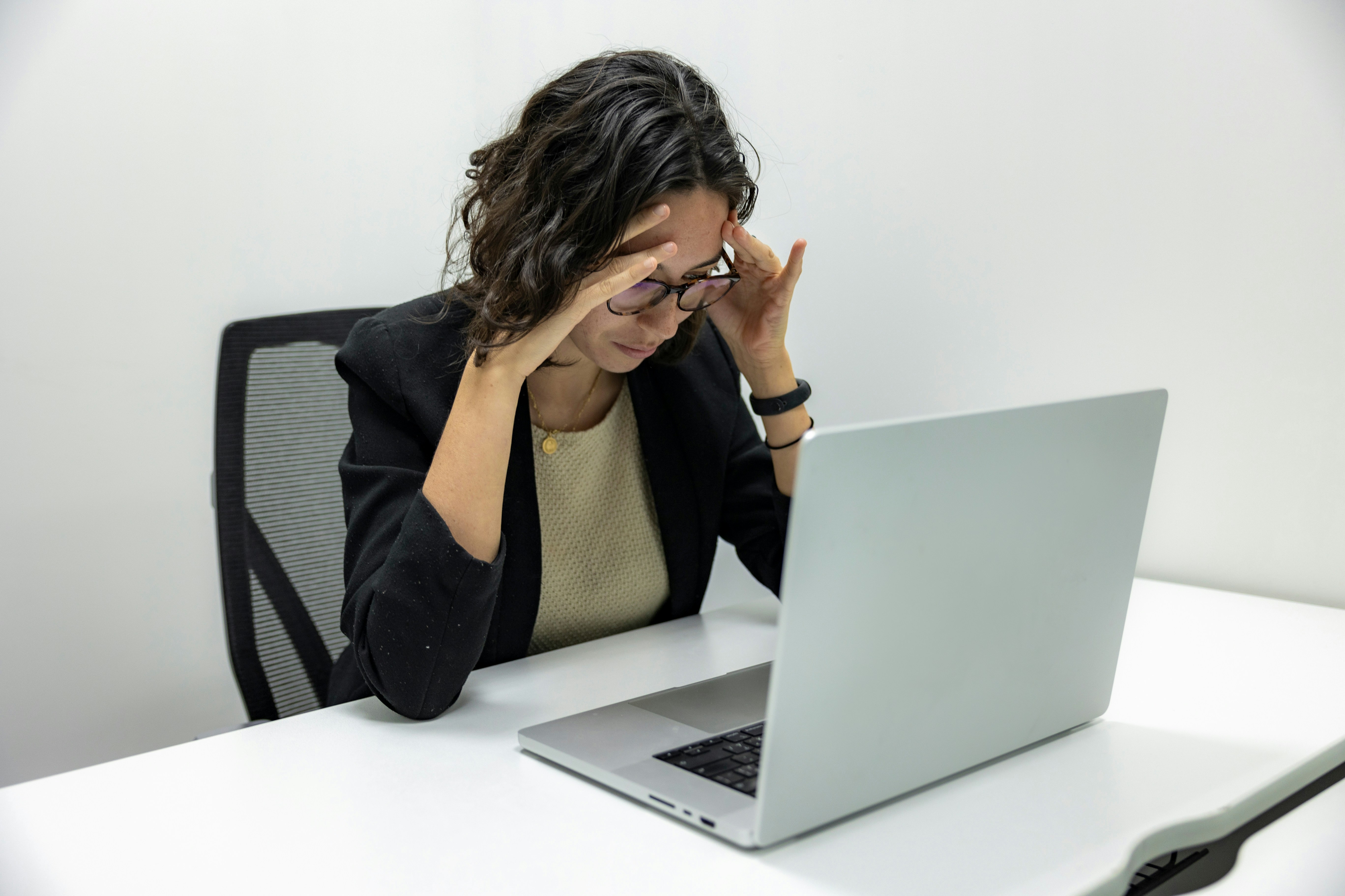 Woman at computer frustrated with offer