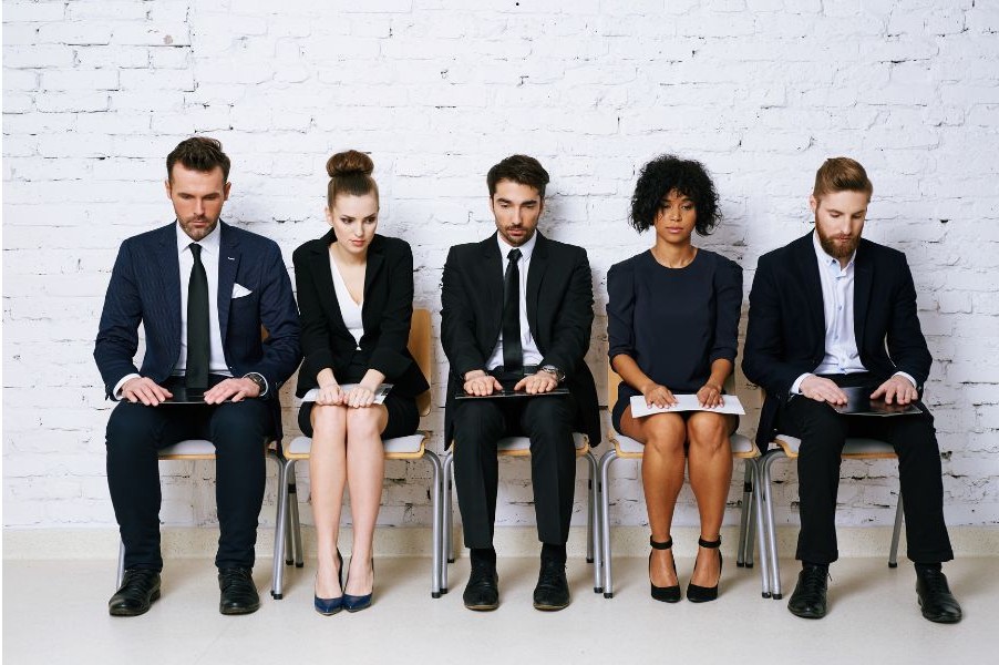 group of candidates stressfully waiting their turn